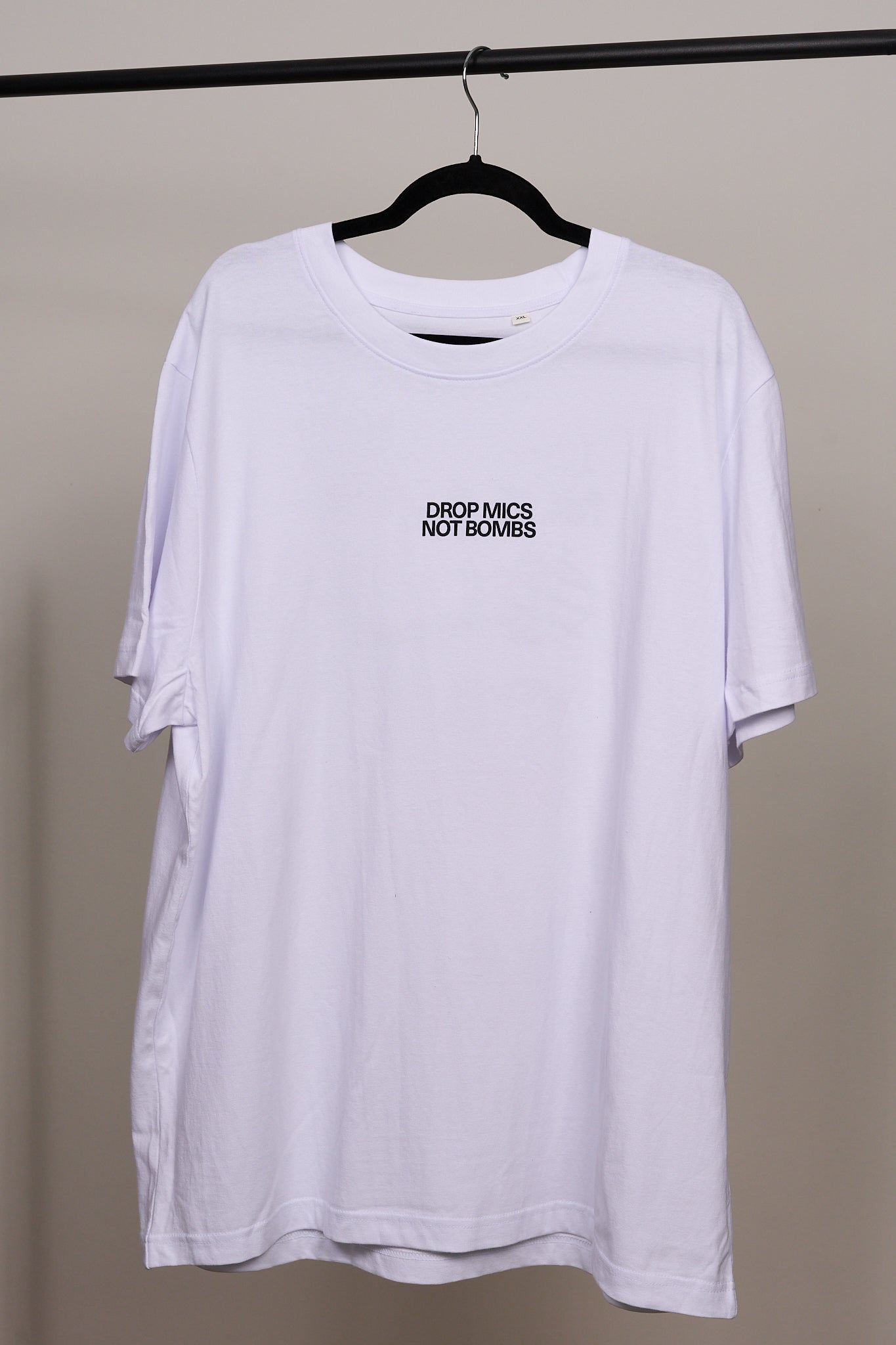 SHIRT "DROP MICS NOT BOMBS"