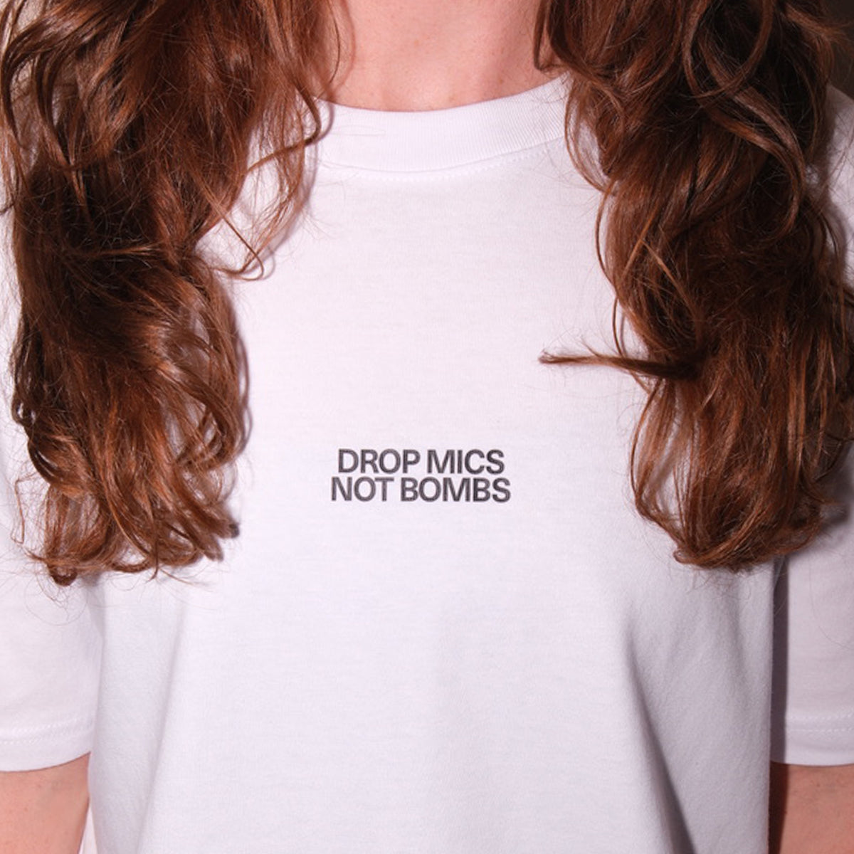 SHIRT "DROP MICS NOT BOMBS"